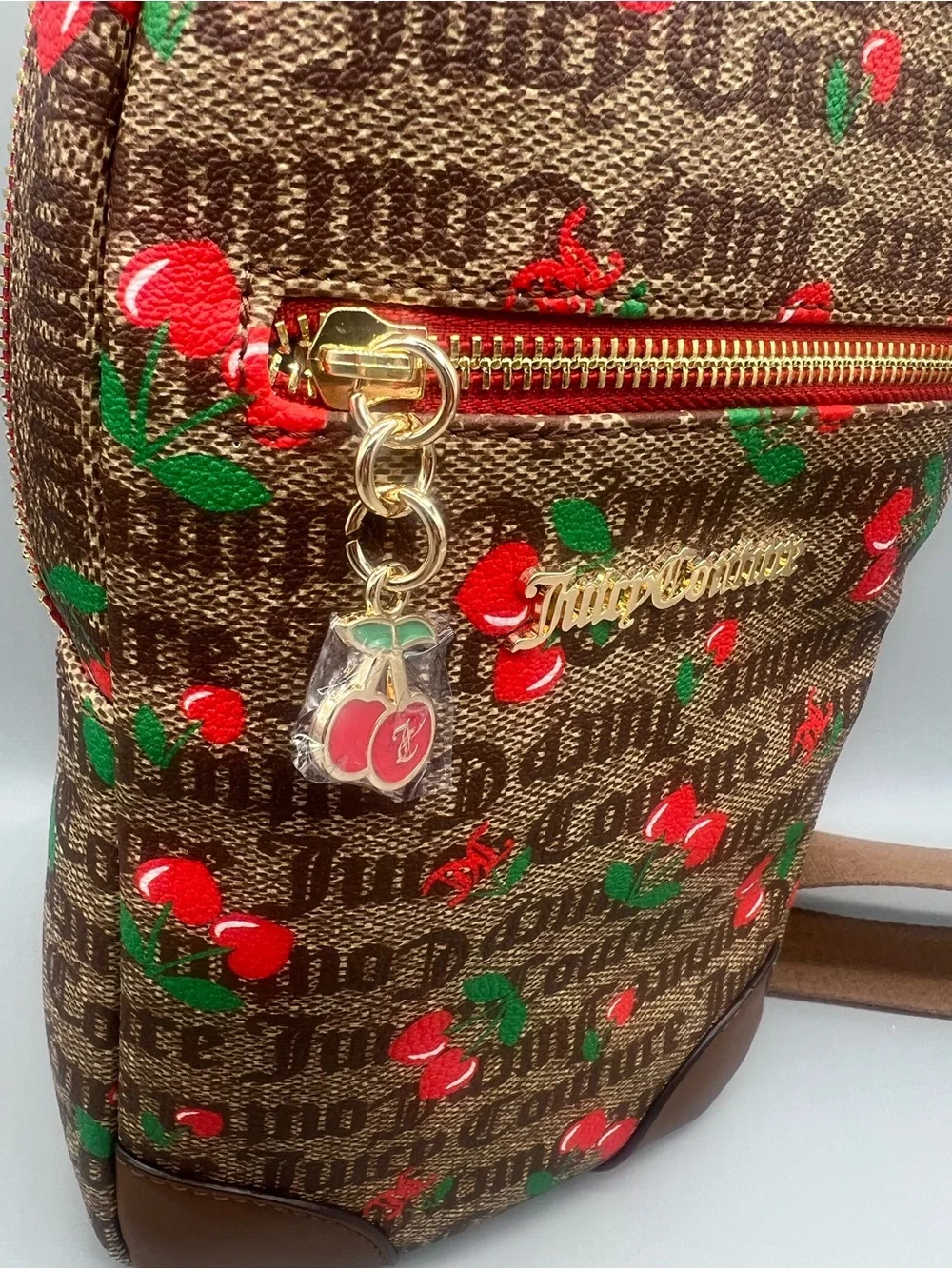 Juicy couture juicy fruit sling backpack